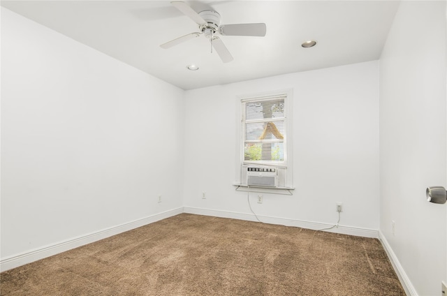 carpeted spare room with cooling unit and ceiling fan