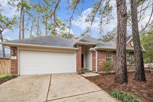 single story home with a garage