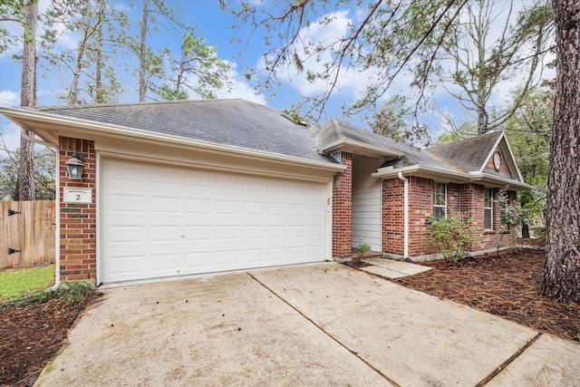 ranch-style home with a garage