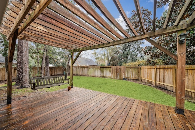 wooden terrace with a pergola and a lawn