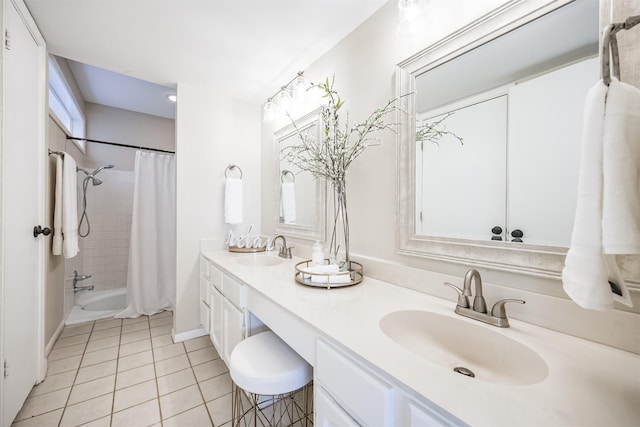 bathroom with shower / bath combination with curtain, vanity, and tile patterned flooring