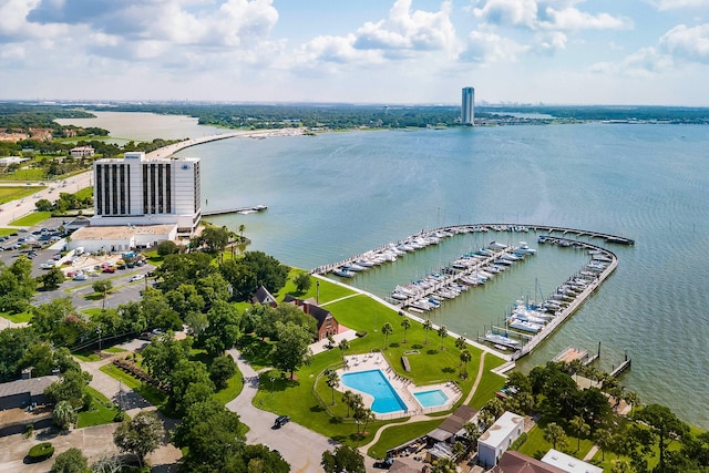 birds eye view of property with a water view