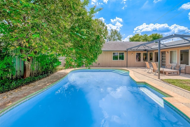 view of pool featuring a patio and a lanai