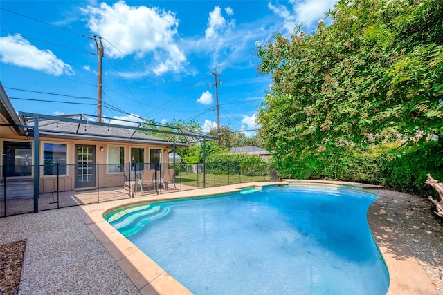 view of swimming pool featuring a patio area