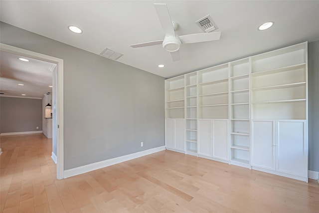 unfurnished bedroom featuring ceiling fan and light wood-type flooring