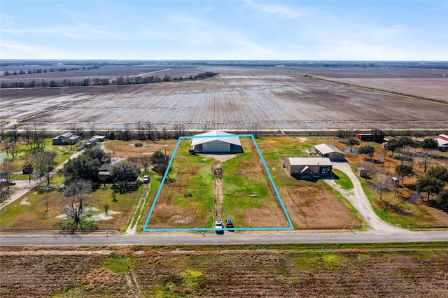 birds eye view of property featuring a rural view