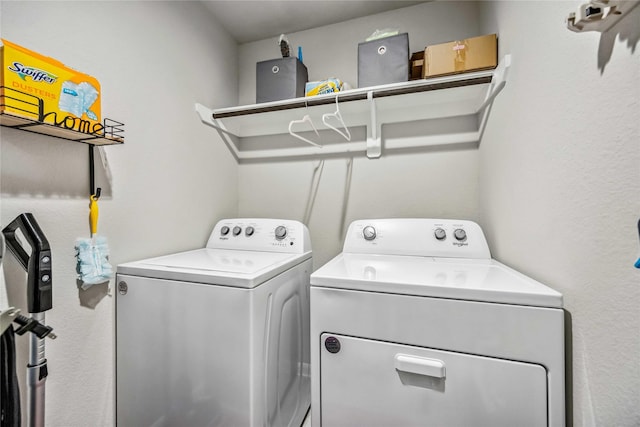 washroom featuring separate washer and dryer