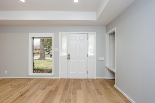 entryway with light hardwood / wood-style flooring