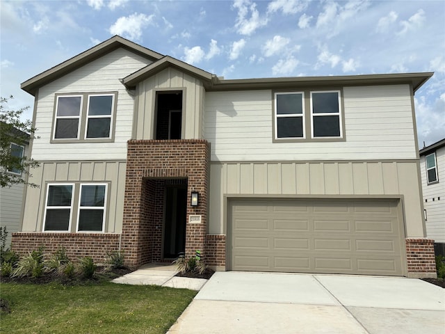 view of front of property featuring a garage