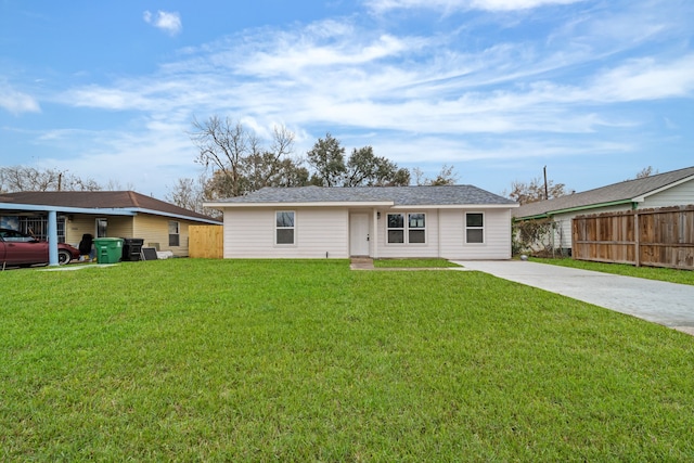 ranch-style home featuring a front yard