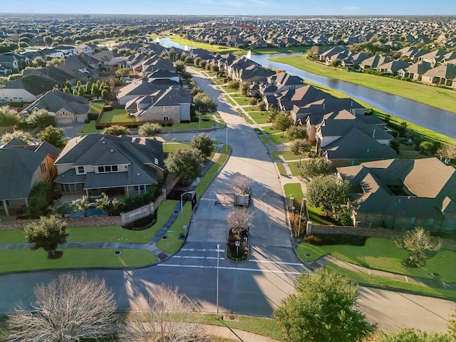 aerial view with a water view and a residential view