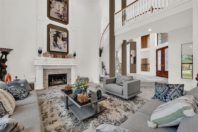 living room with a towering ceiling