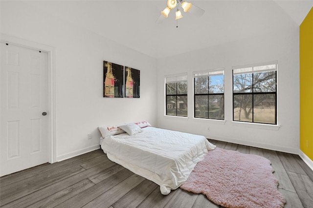 bedroom featuring hardwood / wood-style flooring and ceiling fan