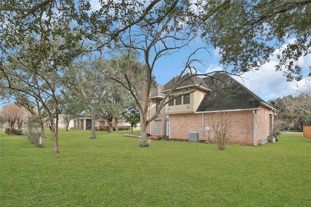 view of yard featuring central AC