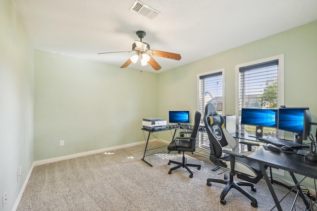 office space with ceiling fan and carpet flooring