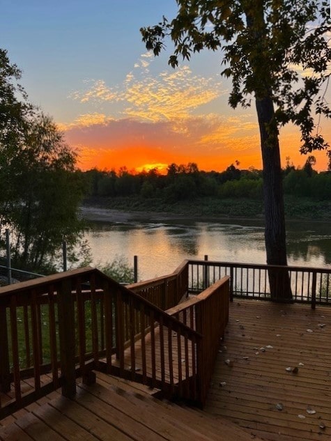 deck at dusk with a water view