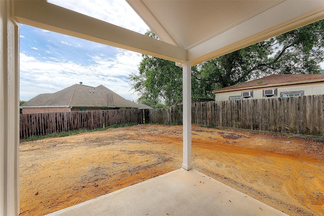 view of yard featuring a patio and a fenced backyard