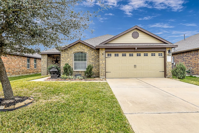 single story home featuring a garage and a front yard