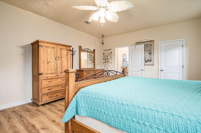 bedroom featuring ceiling fan and light hardwood / wood-style flooring