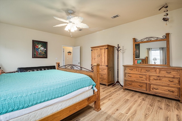 bedroom featuring ceiling fan and light hardwood / wood-style flooring