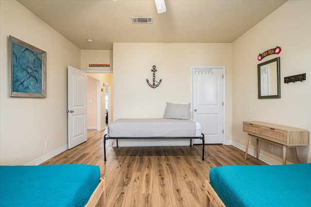 bedroom featuring wood-type flooring