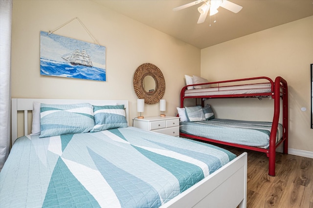 bedroom featuring ceiling fan and light wood-type flooring