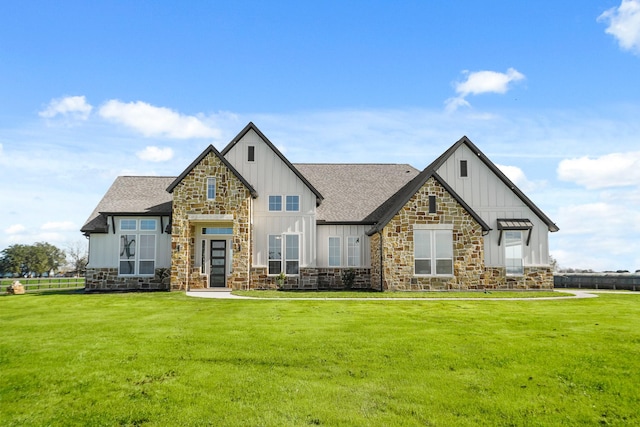 view of front of home with a front lawn