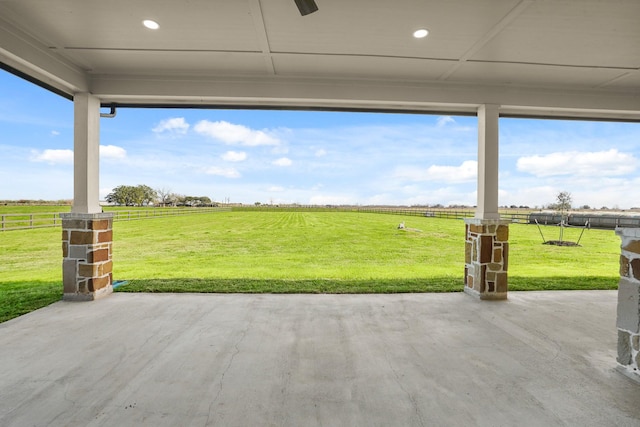 view of patio / terrace with a rural view