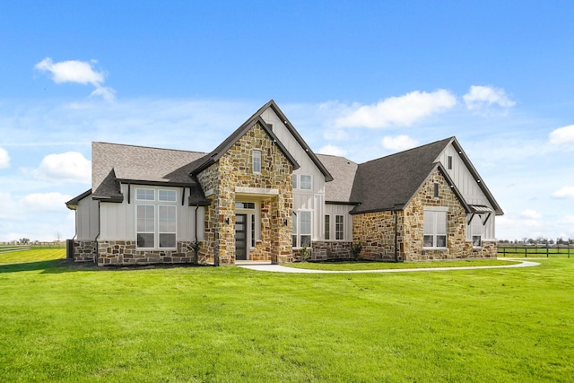 view of front of house with a front lawn