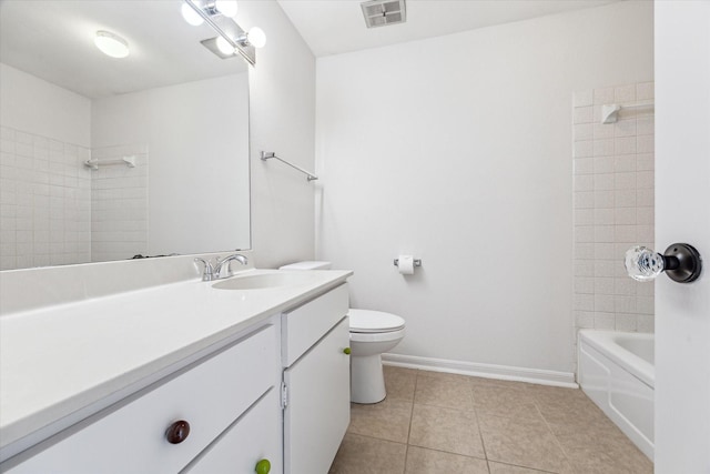 full bathroom with vanity, tiled shower / bath combo, tile patterned floors, and toilet