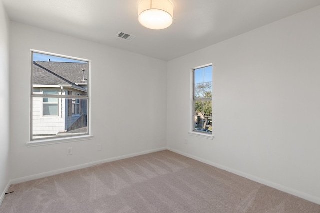 view of carpeted spare room