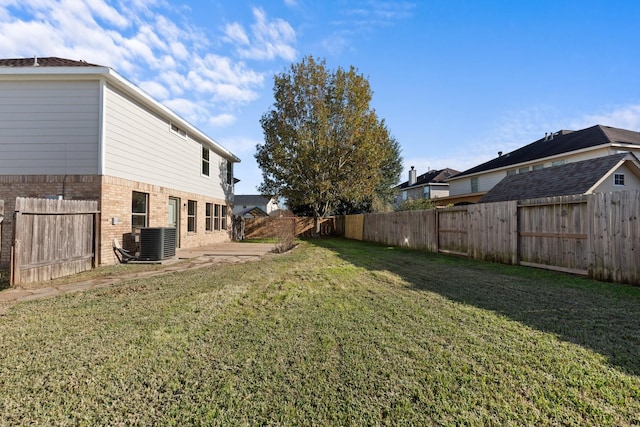 view of yard featuring central AC unit