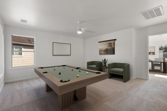 game room with light carpet and ceiling fan