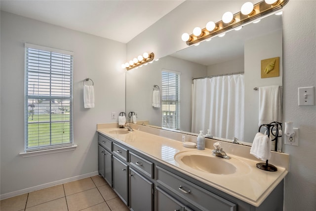 bathroom with vanity and tile patterned flooring