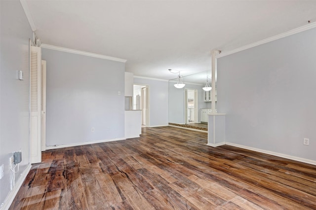 unfurnished living room with crown molding and dark hardwood / wood-style flooring