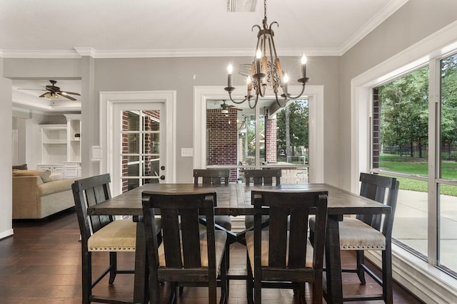 dining area featuring crown molding, dark hardwood / wood-style floors, and ceiling fan with notable chandelier