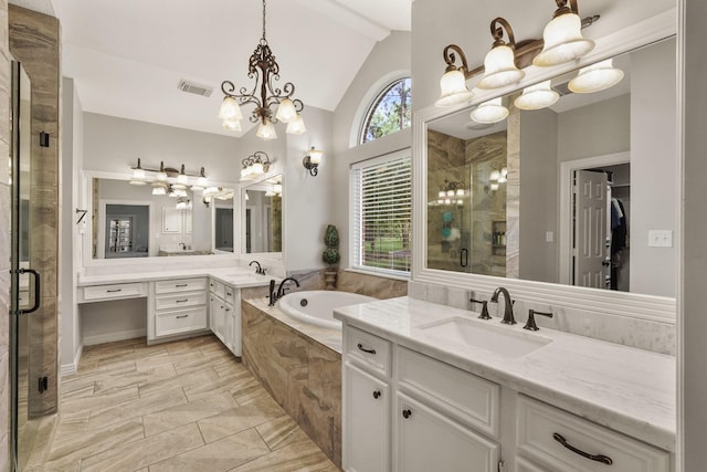 bathroom with an inviting chandelier, lofted ceiling, separate shower and tub, and vanity