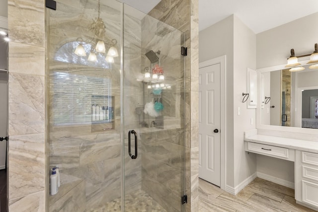 bathroom with vanity and walk in shower