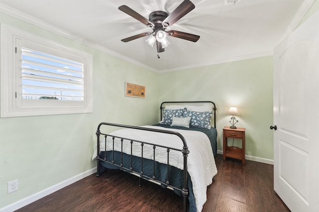 bedroom featuring ornamental molding, dark hardwood / wood-style floors, and ceiling fan