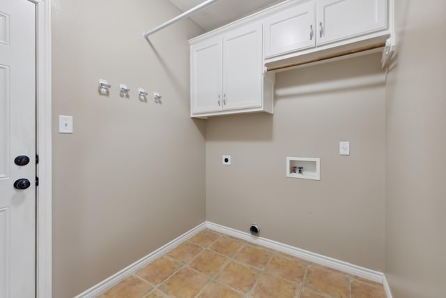 laundry room with washer hookup, cabinets, hookup for an electric dryer, and light tile patterned flooring