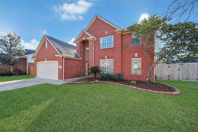 view of front of home featuring a garage and a front lawn