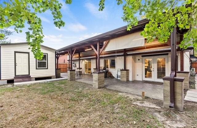 back of house with french doors