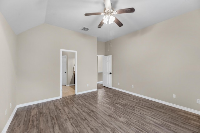 unfurnished bedroom with lofted ceiling, wood-type flooring, and ceiling fan