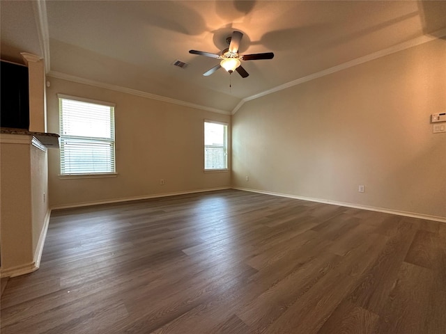 empty room with ornamental molding, dark hardwood / wood-style floors, and ceiling fan