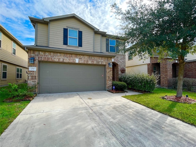 front facade with a garage and a front yard