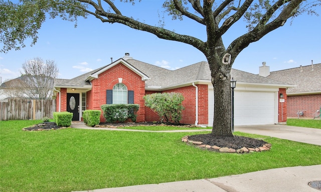 ranch-style house with a garage and a front yard