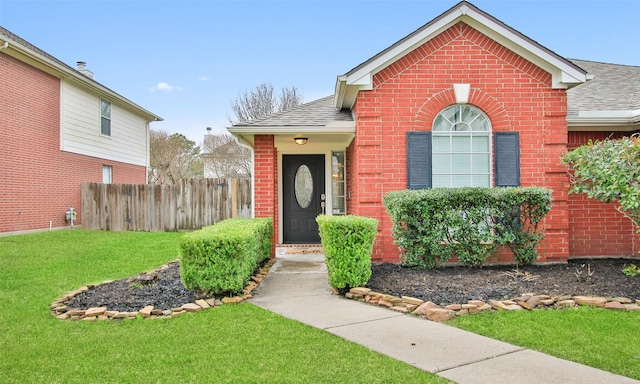 view of property with a front lawn