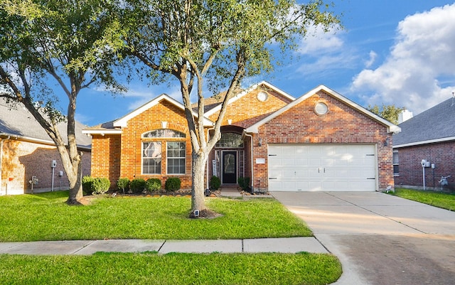 view of front of house featuring a garage and a front lawn