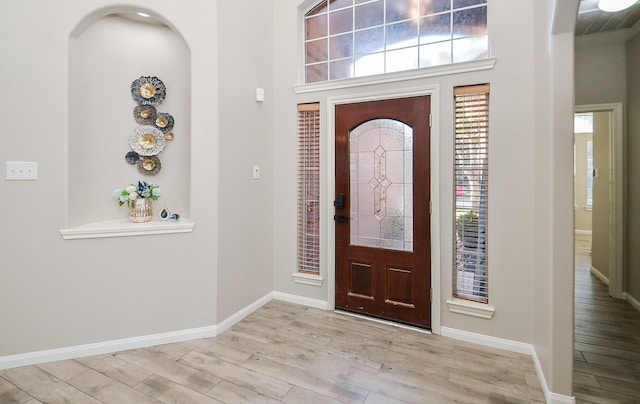 entrance foyer with light hardwood / wood-style flooring