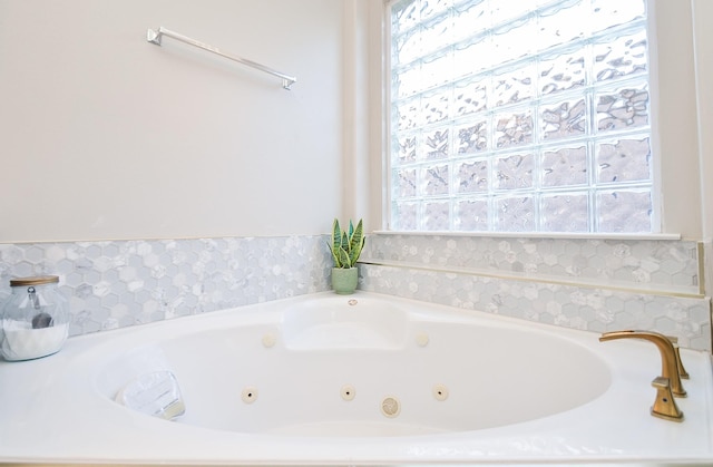 bathroom featuring a tub